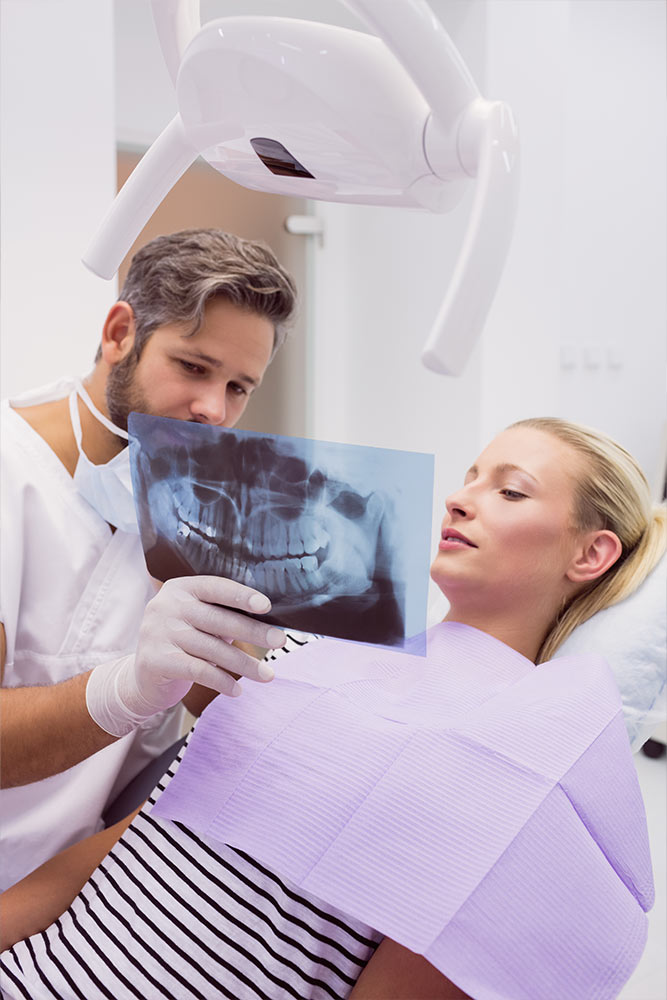 tpd_dentist-showing-x-ray-patient